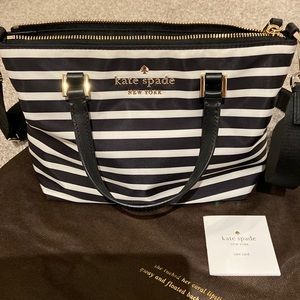 Kate Spade black and white striped handbag with handles and shoulder straps